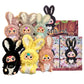Set of colorful blind box plush toys with bunny ears and a packaging box on a white background