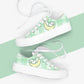 Green plaid kawaii sneakers with white laces on a green and white background