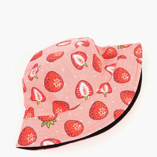 Cute pink bucket hat with strawberry pattern on a white background