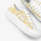 White sneakers with a kawaii cat design on a white background