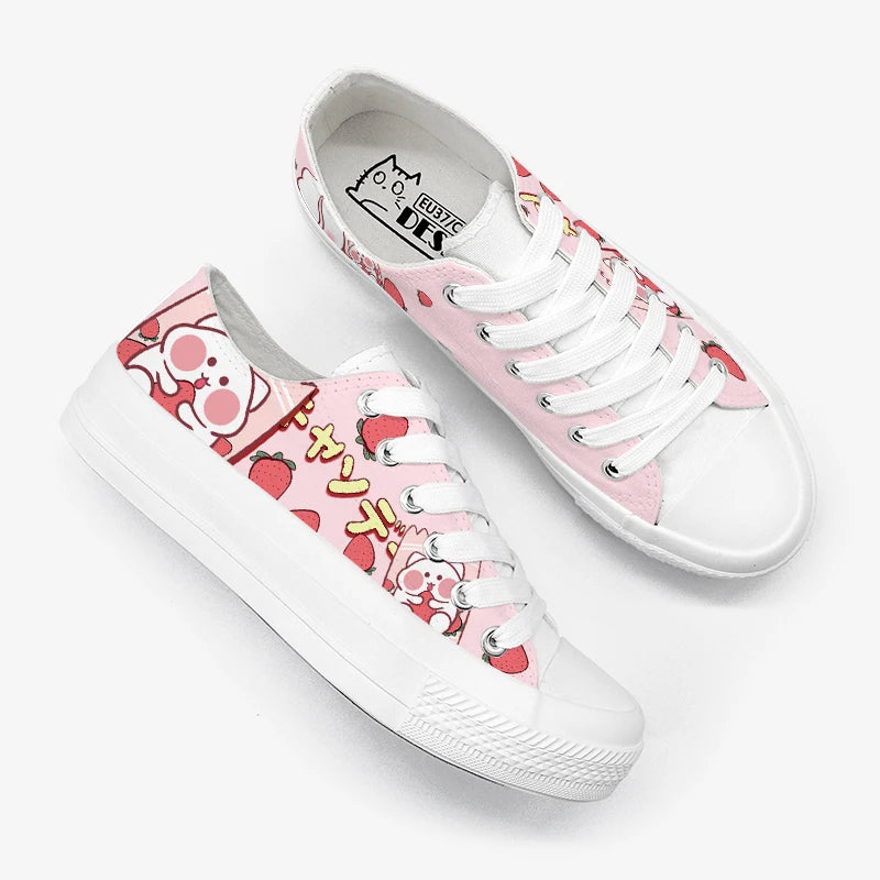 pink kawaii hamster trainers on a white background with one shoe tilted on its side