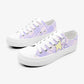 Pair of white sneakers with a purple and white plaid pattern, a star and cat on a white background