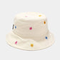 Beige bucket hat with colorful flower patterns on a white background