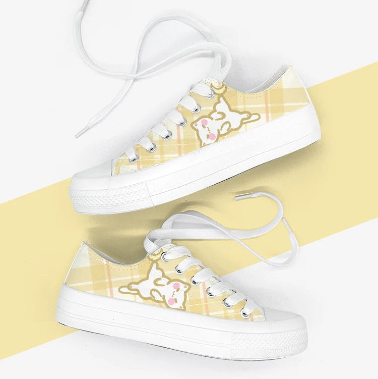 White kawaii cat sneakers with yellow plaid design on a white and yellow striped background