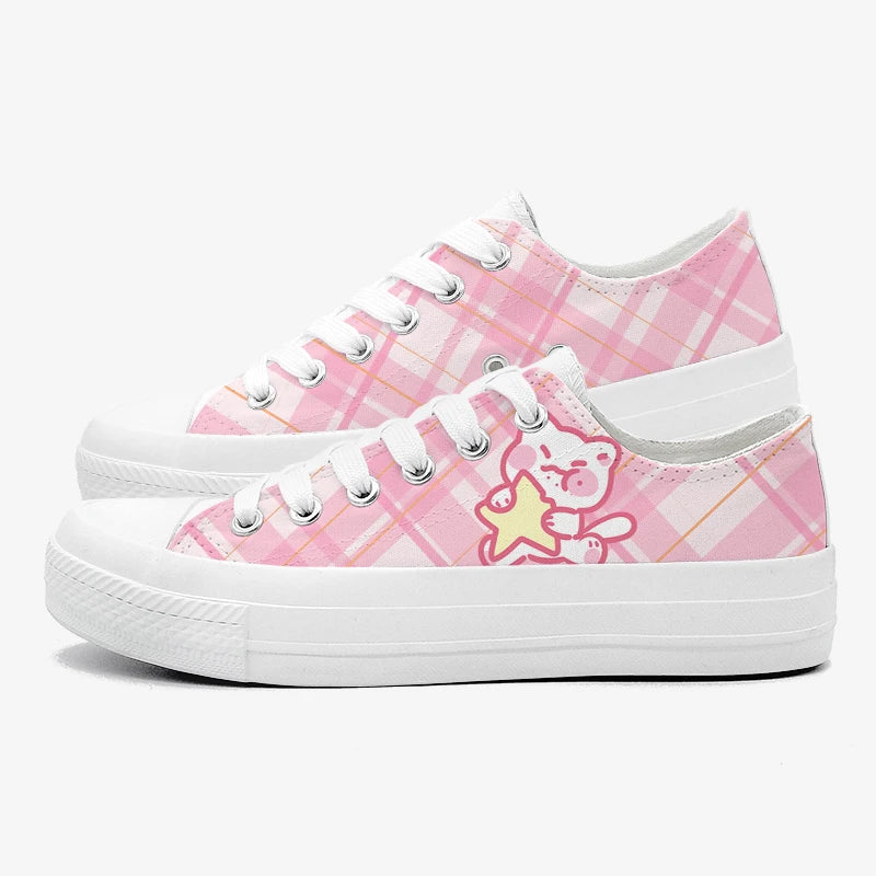 Pink plaid sneakers with a kawaii cat and star on a white background