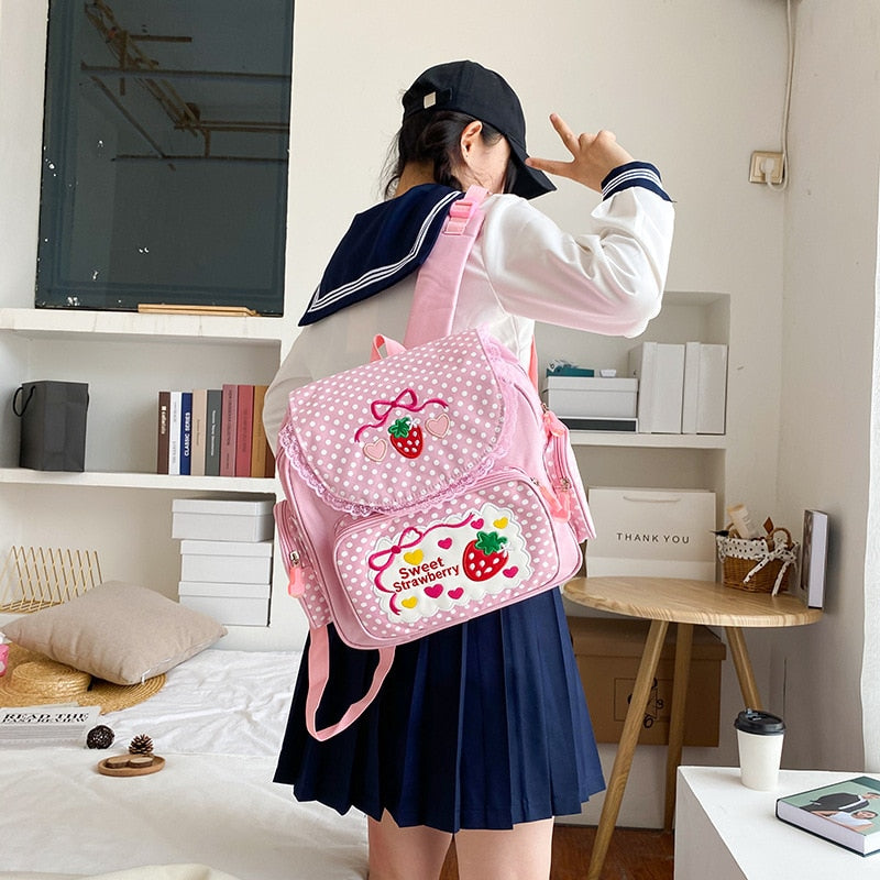 School Girl Wearing Kawaii Pink Sweet Strawberry Backpack