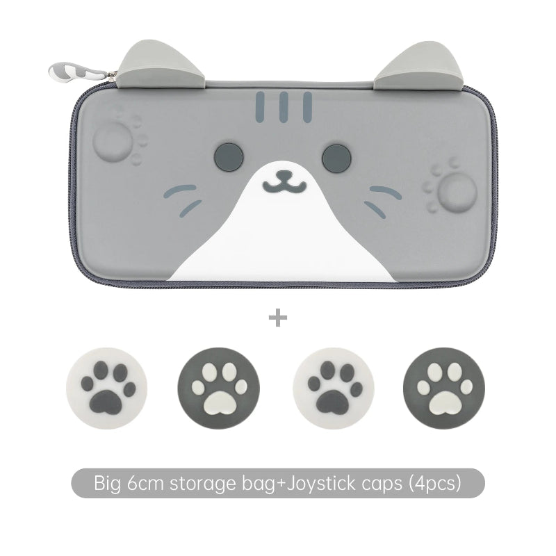 Gray gaming console case with cat ears and paw prints, plus joystick caps on a white background