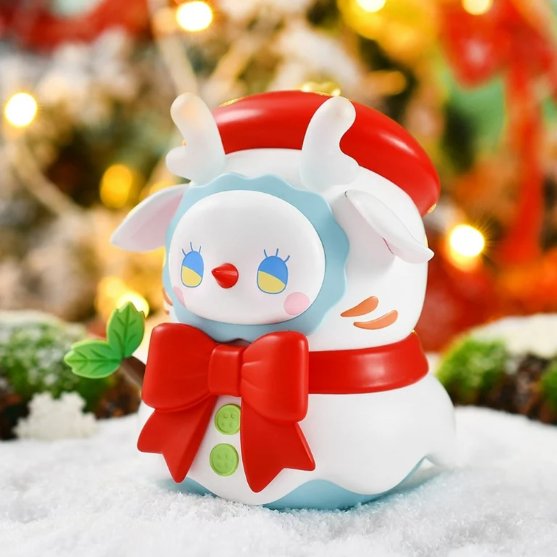 Emma Secret Forest Series - Snowman Night Light, close up of the product with a blurred christmas tree in the background