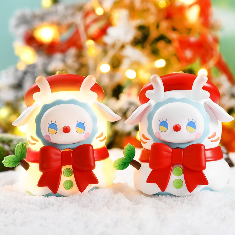 Emma Secret Forest Series - Snowman Night Light, displayed with blurred Christmas tree in  the background