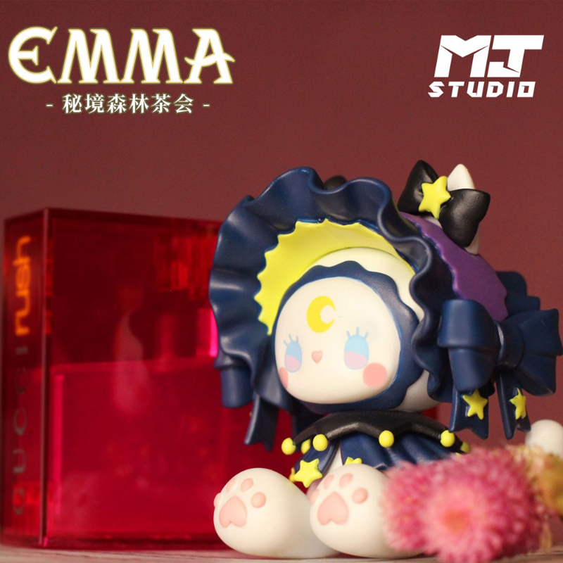 Toy figure with starry design and red box in the background, featuring 'EMMA' and 'MT Studio' logos.
