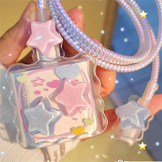Star-shaped phone case with a colorful strap held by a hand against a blurred background