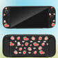 Black gaming console with strawberry pattern on a gradient background