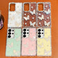 Set of six phone cases with butterfly designs on a brown surface, the colors being mint green , pink , pastel yellow and white, the other designs left are see through