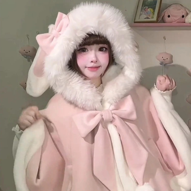 Woman wearing Kawaii hooded pink bunny cloak