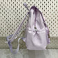 Kawaii Polka Dot Backpack rear view in light purple sideview 
