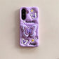 This image is showing Kawaii Butterfly Samsung Phone Case, one option is the purple design with a large 3D butterfly in the middle which is a phone grip, with smaller butterflies around it and some white flowers. 