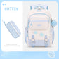 Cutesy white and light blue backpack with matching pouch on a light blue background