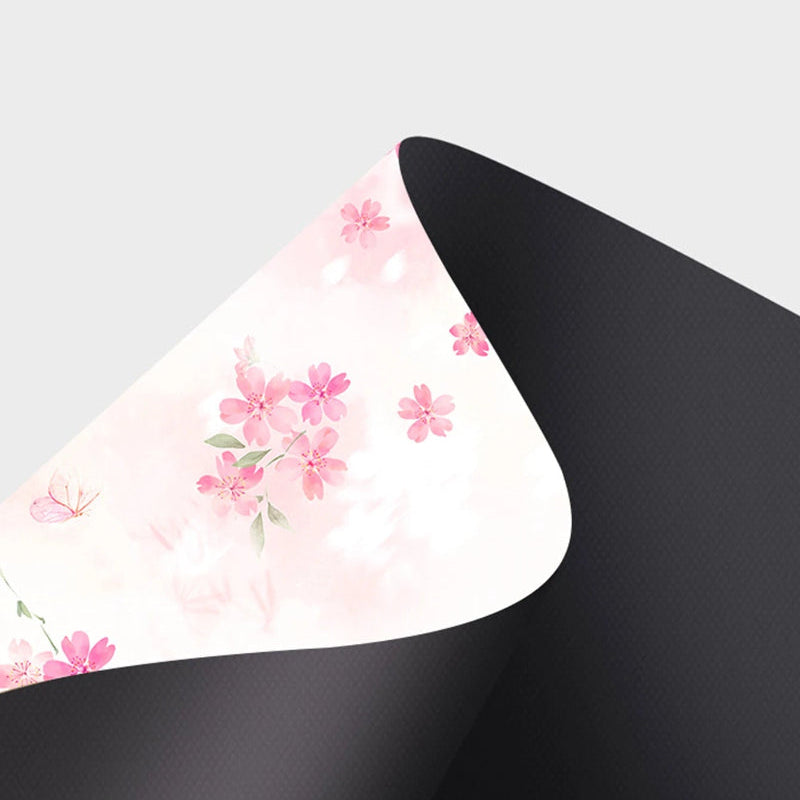 Floral-patterned material on a grey background 
