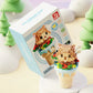 kawaii ice cream building blocks brown cat edition is displayed on a snowy background along side its box