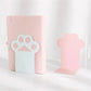 Pink paw-shaped bookends on a white background