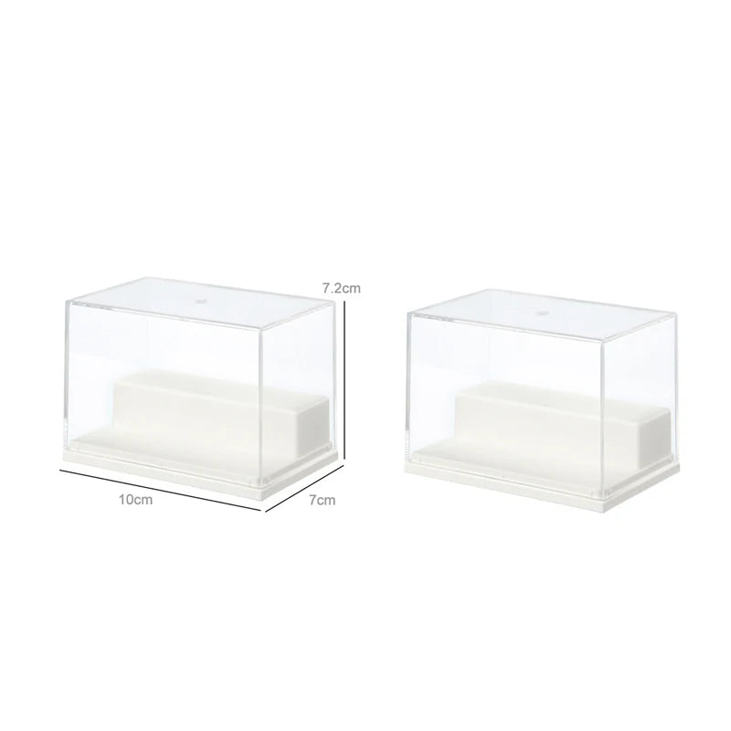 Two clear acrylic display boxes with white interior pedestals, shown on a white background with dimension labels indicating 10cm width, 7cm depth, and 7.2cm height.