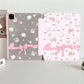 tablet case with cute animal and bow design on a light gray background