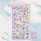 Pack of colorful stickers with cartoon characters on a light blue background