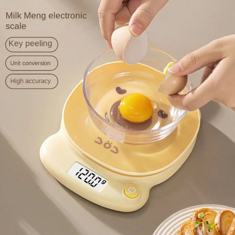 Digital kitchen scale with an egg being weighed, showing the brand 'Milk Meng'.