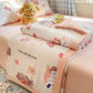 Kawaii Spring Quilts , the set being show is the Cute Puppy Friend Design, its being displayed on a bed half open.
