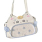 Cartoon-style handbag with star pattern on a white background