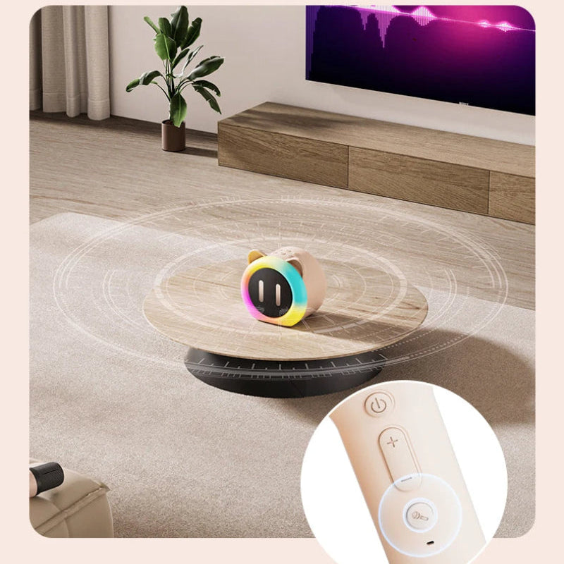 Cute Cat Mini Karaoke Speaker pink edition displayed on a wooden table top with an explanation of it having  a handy mute button.