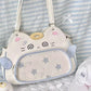 Cute cat-shaped handbag on a striped background
