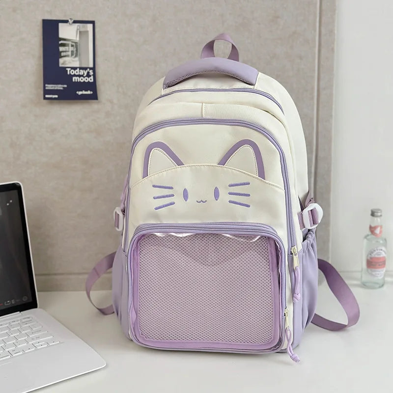 Purple neko backpack displayed by a white wall
