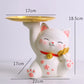 White cat-shaped table with gold tray, measurements indicated, on a light gray background