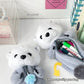 Kawaii otter plush pal pencil case displayed on a white surface.
