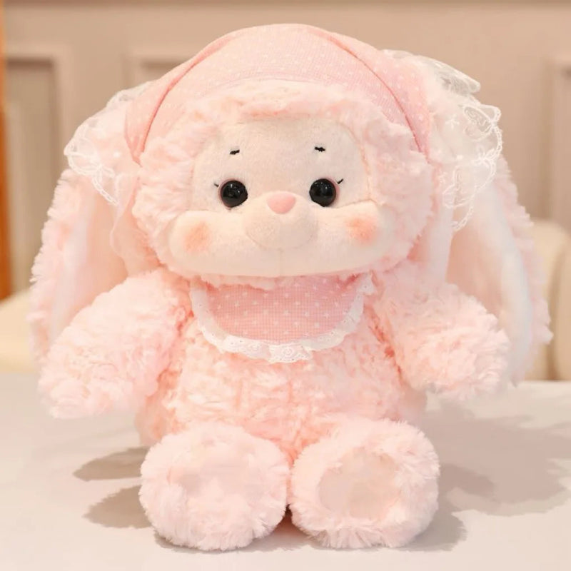 Pastel Kawaii Plushie sitting on a bed 