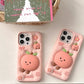 Rear view of Kawaii Peach iPhone Cases displayed on a countertop