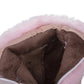 Close-up of a brown plush interior with pink exterior of the boot