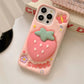 Rear view of Kawaii Sweet Strawberry Butterfly iPhone Case  on a desk 