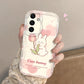 Phone case with a cute bunny design held by a person against a neutral background
