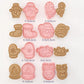 Set of Christmas-themed cookie cutters with measurements on a white background