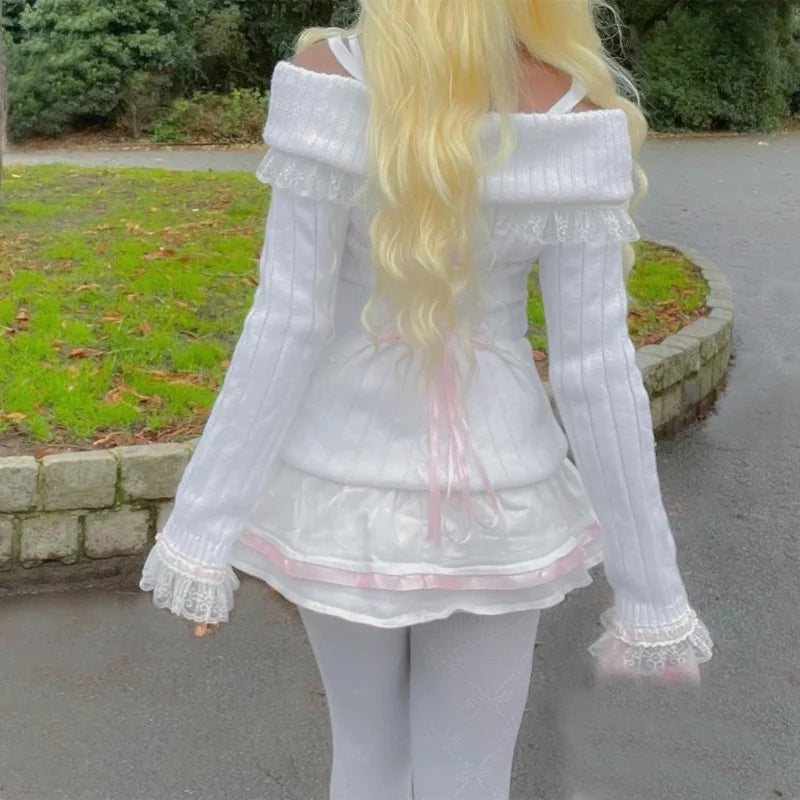 Rear view of a Kawaii Coquette Off Shoulder Ribbon Sweater modeled by a woman in white 