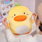 A women squishing the cheeks of the Kawaii Derpy Duck Plushie