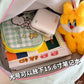 Kawaii Pastel-colored backpack with star designs, this is displayed open so you can see the storage 