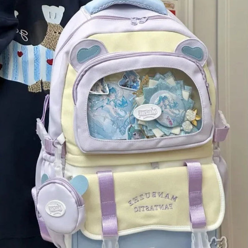 beary cute backpack with bear ears and a visible brand logo on a persons back