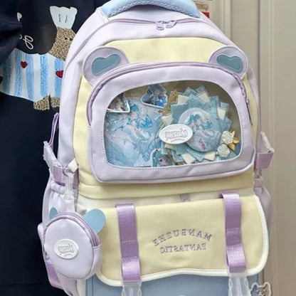 beary cute backpack with bear ears and a visible brand logo on a persons back