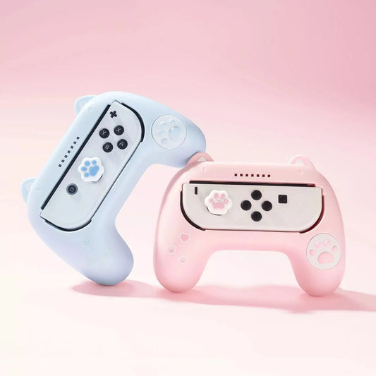 Two gaming controllers, one blue and one pink, on a pink background