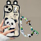 women holding kawaii panda samsung phone case with beaded charm attached and ears on a light grey background  with the panda stood up holding bamboo on the case