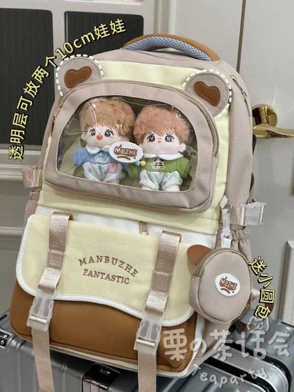 beary cute backpack with bear ears and a visible brand logo, against a white door , brown version