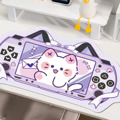 Mouse pad with a kawaii design of a cat  on a desk.
